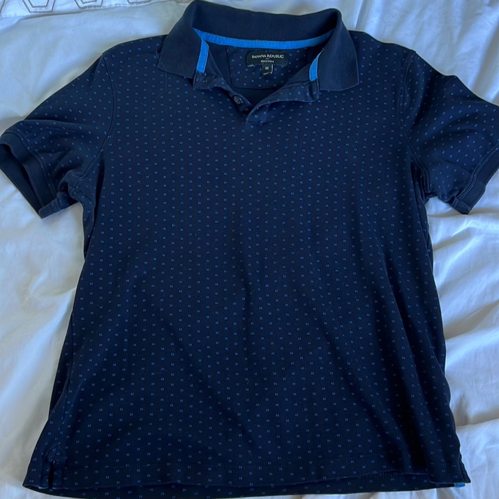 Navy with blue trim in collar & blue design